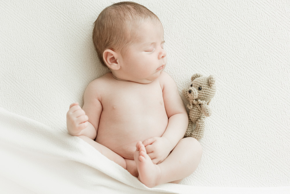 photo bébé avec doudou ourson
